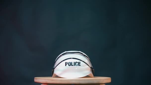 Closeup of a white helmet with the inscription police — Stock Video