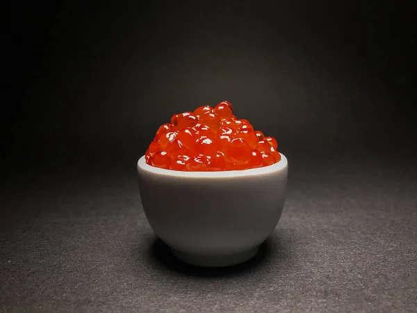 Red salmon caviar. Delicacy. Close-up on an isolated background. — 스톡 사진