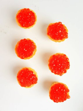 Tartlets with red salmon caviar. Snack, delicacy