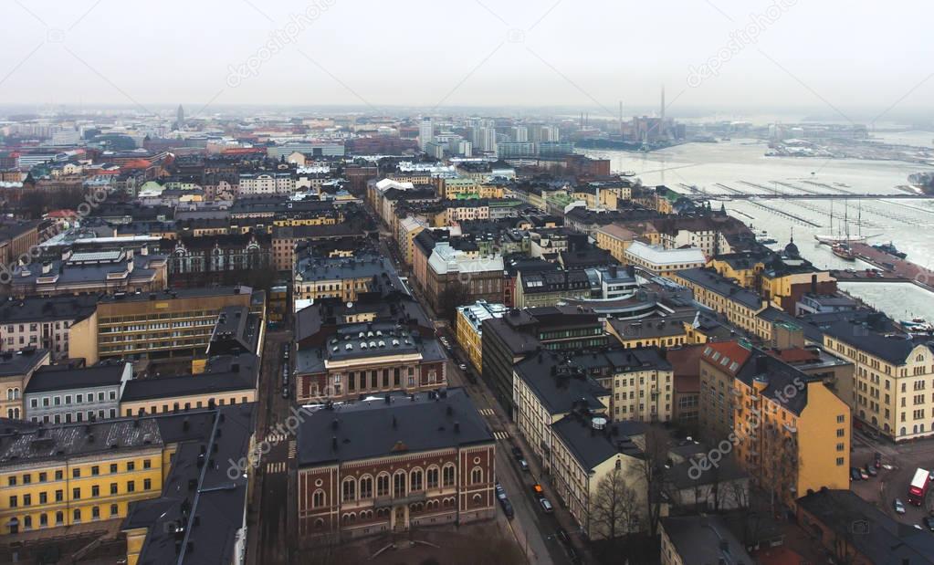 Beautiful super wide-angle summer aerial view of Helsinki capital, Finland with skyline and scenery beyond the city and harbour, seen from the quadrocopter air drone