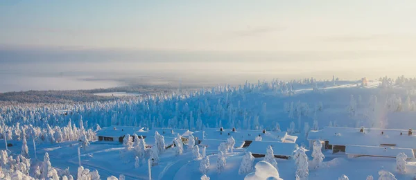 Beautiful cold mountain view of ski resort, sunny winter day with slope, piste and ski lift