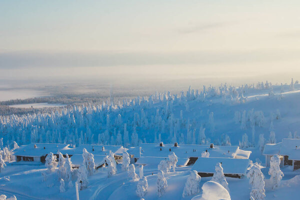 Beautiful cold mountain view of ski resort, sunny winter day with slope, piste and ski lift