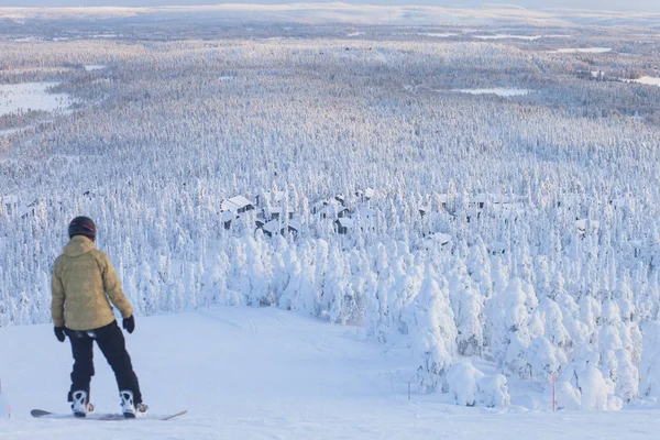 Beautiful cold mountain view of ski resort, sunny winter day with slope, piste and ski lift