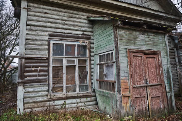 Abandoned building, broken Windows, old door