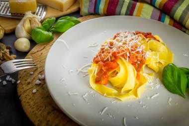 Fresh pasta with tomato sauce.