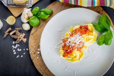 Fresh pasta with tomato sauce.