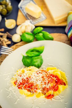 Fresh pasta with tomato sauce.
