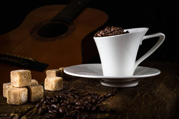 Taza de café y azúcar de caña — Foto de Stock