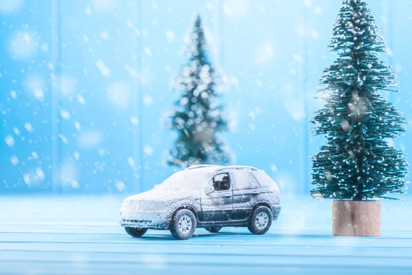Miniature toy car with a Christmas tree — 图库照片