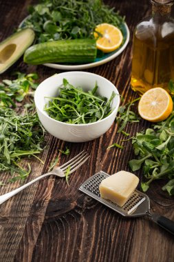 Lettuce and a bottle of olive oil