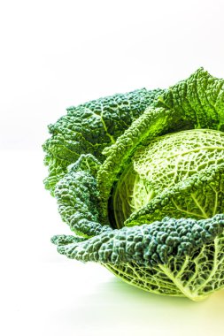 Savoy cabbage on the white background