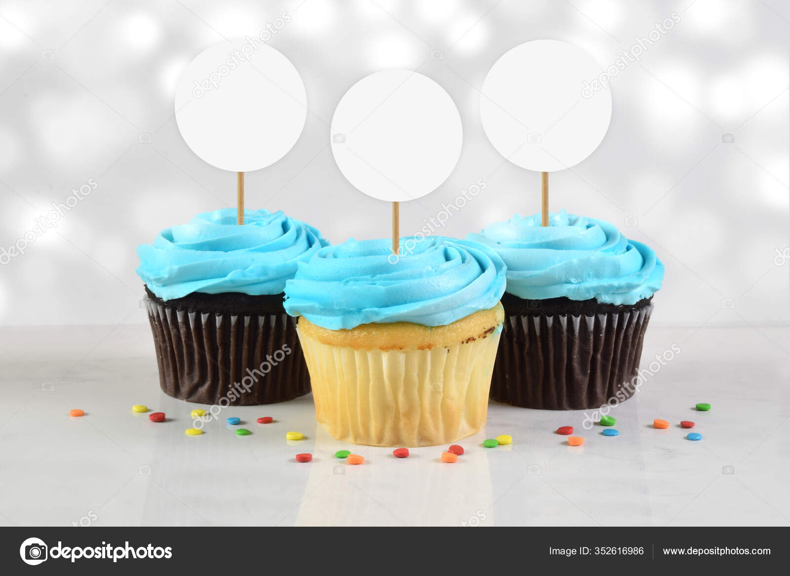 Download Cupcake Topper Mockup Features Three Delicious Blue Frosted Cupcakes Atop Stock Photo Image By C Melissa6980 352616986