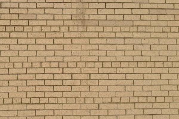 Photo Grunge Tan Brick Wall Taken Outdoors Sunny Day — Stock Photo, Image