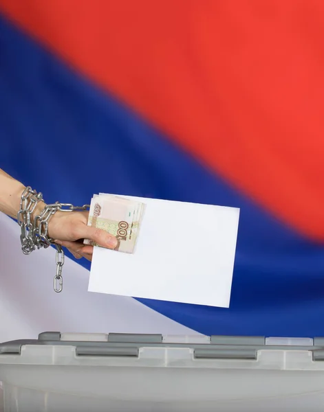 Female hand casts ballot paper in the ballot box. — Stock Photo, Image