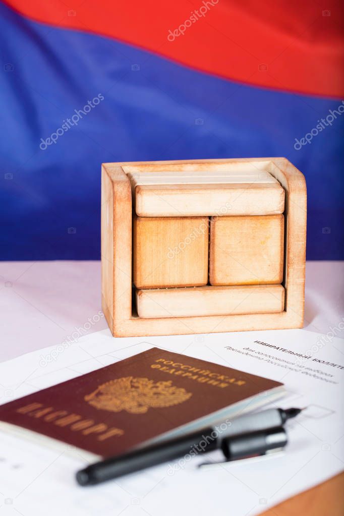Wooden calendar with free text in front of Russian flag. 