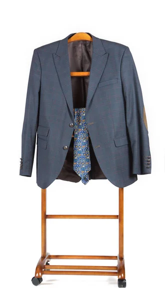 Male classical jacket and a tie are on a jacket hanger stand. — Stock Photo, Image