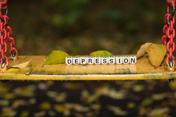 Word ahşap harflerden oluşan depresyon.