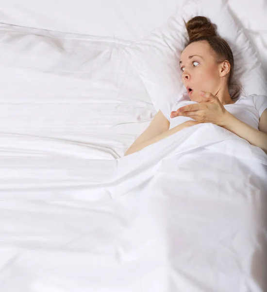 Surprised Young Caucasian Lady Bed Closeup Stock Picture