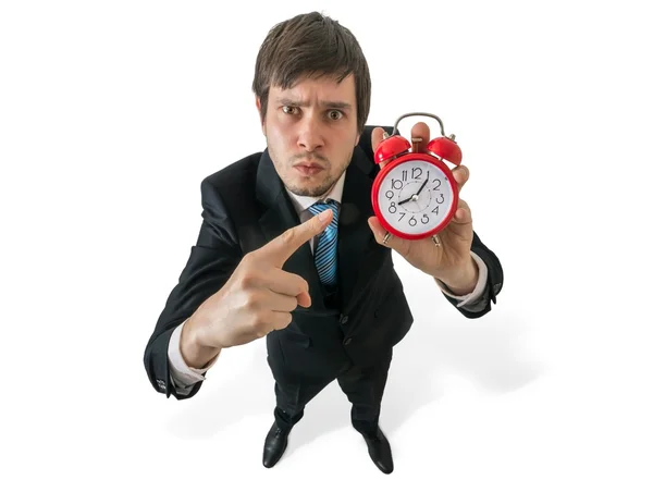 Concepto de disciplina en el trabajo. El jefe enojado señala el reloj. Aislado sobre fondo blanco . — Foto de Stock