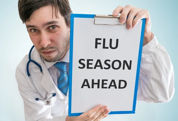 O médico está a avisar contra a gripe. Vista de cima . — Fotografia de Stock