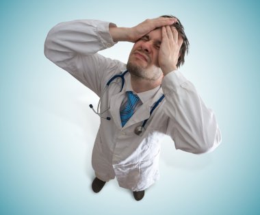 Disappointed and stressed doctor. Failure and malpractice concept. clipart