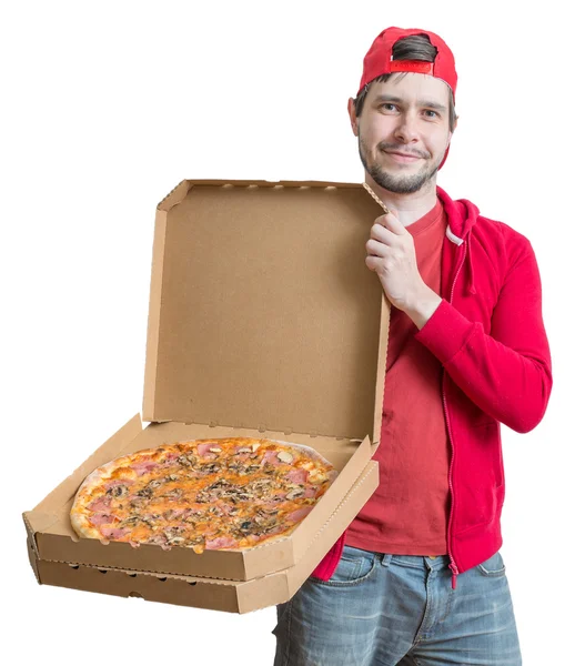 Pizza-Lieferkonzept. Der junge Mann hält Kisten mit Pizza in der Hand. isoliert auf weißem Hintergrund. — Stockfoto