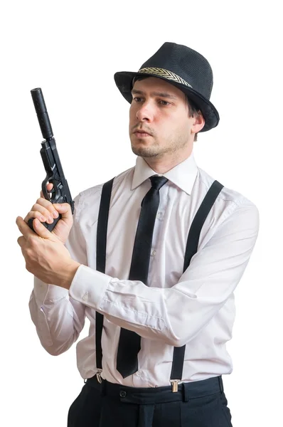 Молодой мафиози или детектив держит пистолет в руках. Изолированный на белом фоне . — стоковое фото