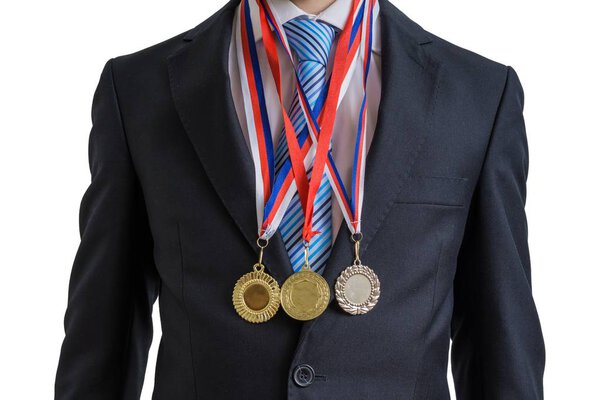 Awarded successful businessman is wearing many medals. Isolated on white background.