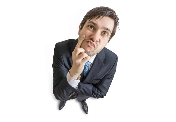 Young suspicious or skeptic man is looking at you. View from top — Stock Photo, Image