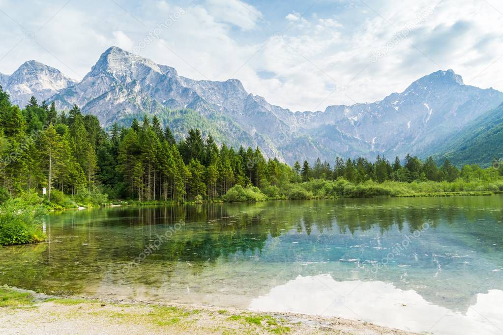 Alps mountains and lake in Almsee in Austria.