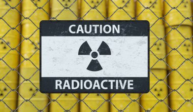 Zincir bağlantı çit ve birçok radyoaktif dikkat işareti wi varil