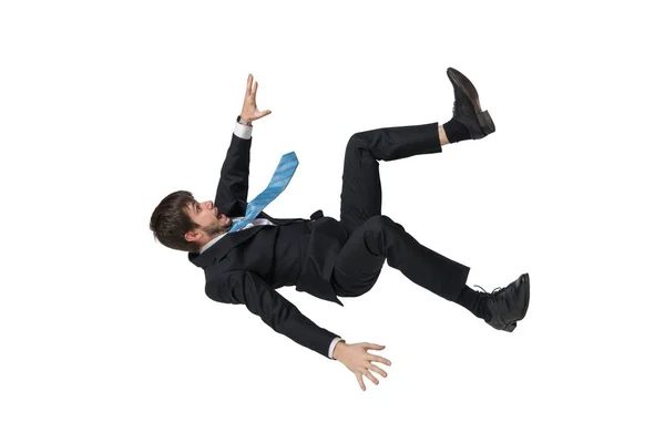 Молодой бизнесмен падает в свободном падении. Изолированный на белом b — стоковое фото