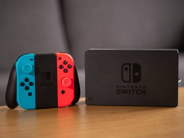 UK - Feb 2020: Nintendo Switch joy con remote controllers and portable console