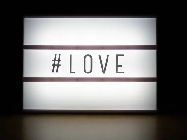 Хэштег Light Box Love Message Dark — стоковое фото