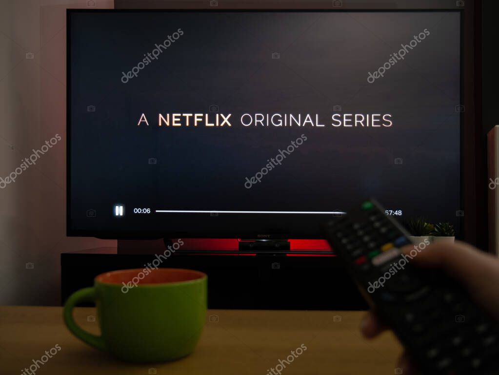 UK, March 2020: TV Television Netflix original series with remote control