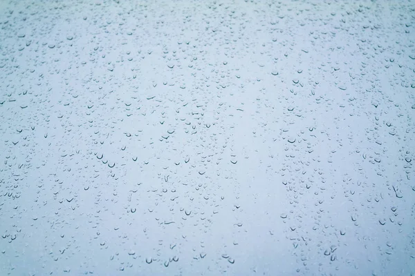 Капли Дождя Стекло Небо Окном Синий Фактурный Фон Каплями Воды — стоковое фото