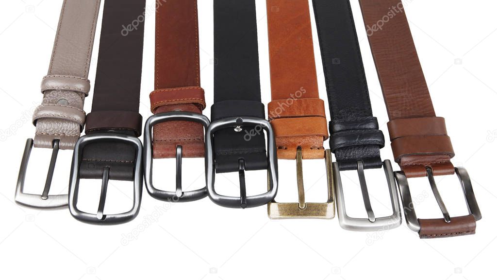 View of different leather belts with buckles isolated on white background