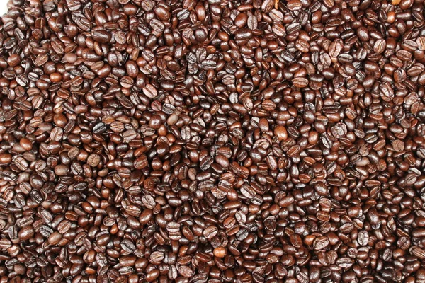 Beaucoup de grains de café torréfiés au marché de rue — Photo