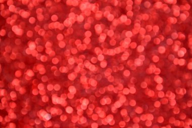 Parıldayan ile parlak ve soyut kırmızı arka plan bulanık glitter