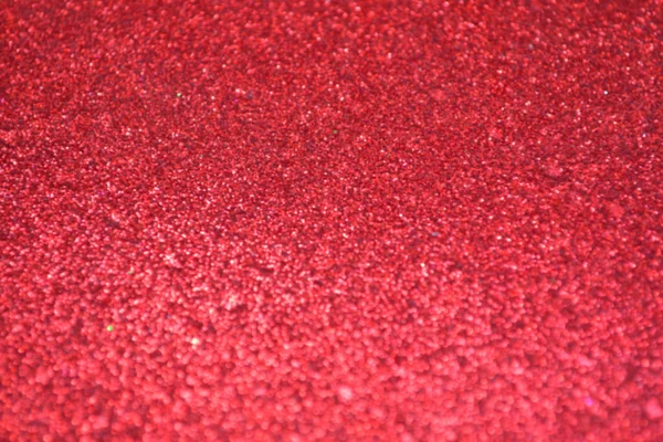 Bright and abstract blurred red background with shimmering glitter — Stock Photo, Image