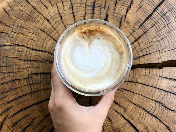 Cup of coffee latte with heart shaped foam — Stock Photo, Image