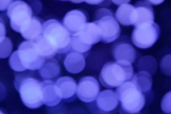 Bright and abstract blurred violet background with shimmering glitter — Stock Photo, Image