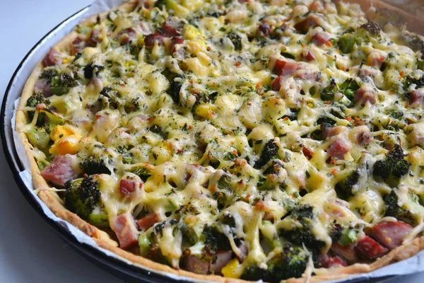 Tasty pizza with broccoli, eggs, cheese and meat — Stock Photo, Image