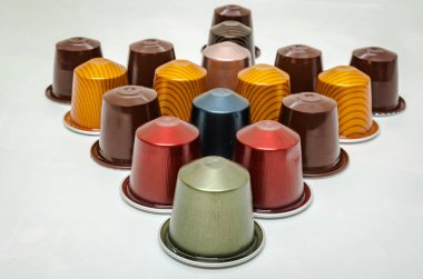 colorful coffee capsules arranged in a tree form