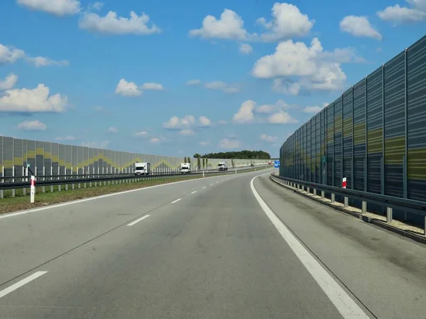 Empty highway with noise walls