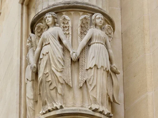 Angels holding hands — Stock Photo, Image