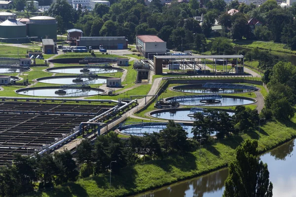 Aerial view of storage tanks in sewage water treatment plant — Stock Photo, Image