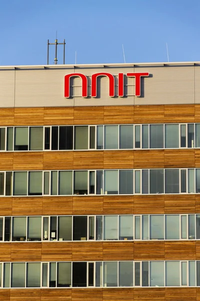 NNIT international IT service provider company logo on Czech headquarters building — Stock Photo, Image