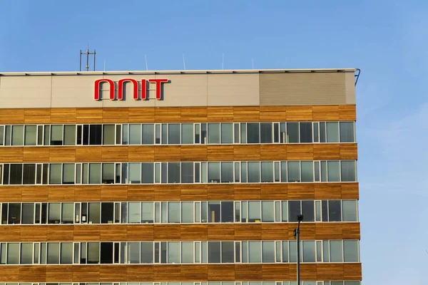 NNIT international IT service provider company logo on Czech headquarters building — Stock Photo, Image