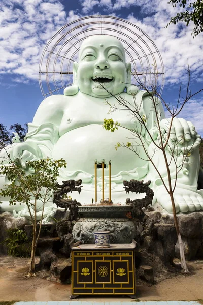 Laughing Buddha statue near Linh An Tu Temple, Dalat, Vietnam